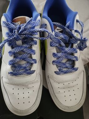 Nike Kids White Sneakers with Blue Laces and Neon Green Swoosh